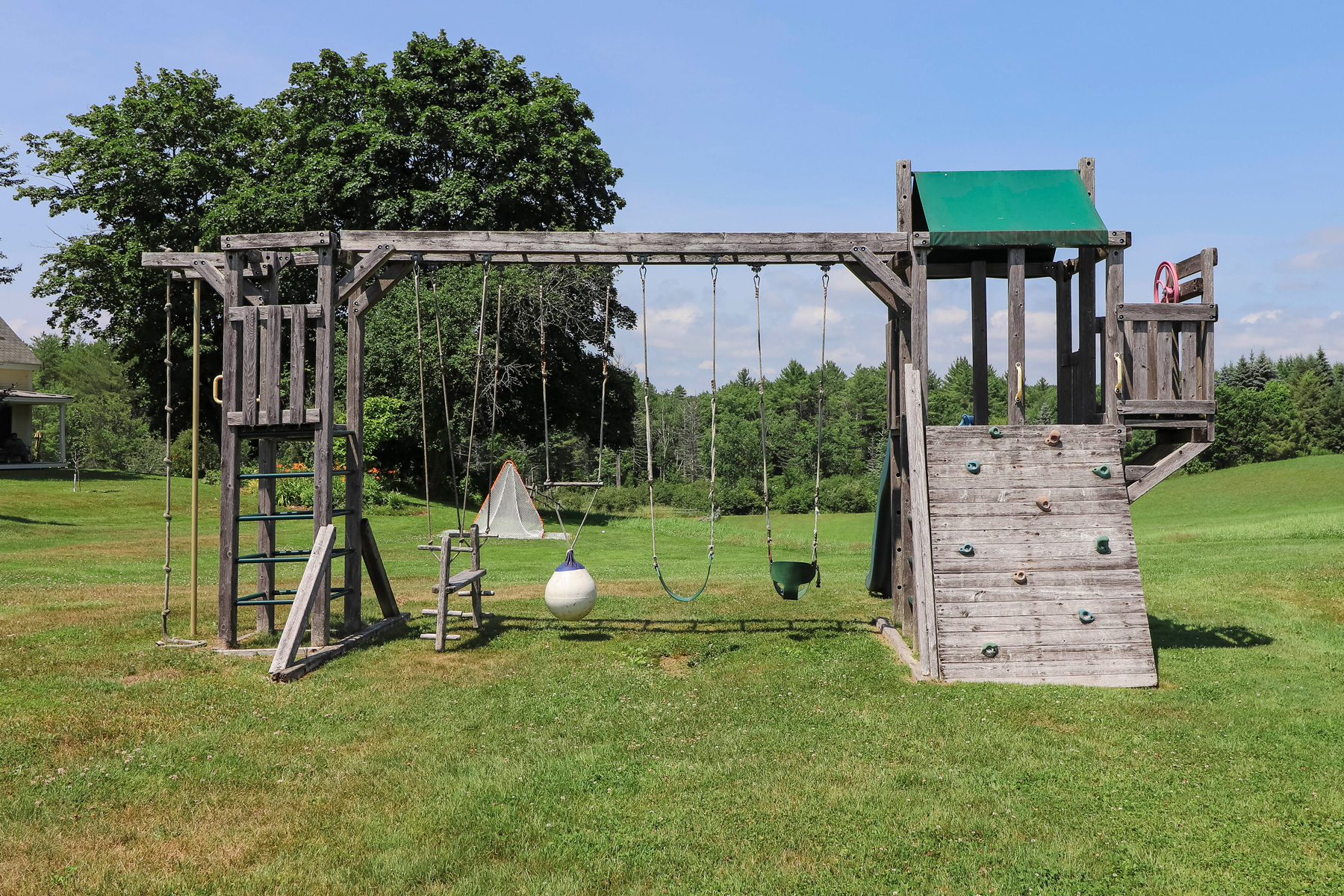 kids swings and climbing structure